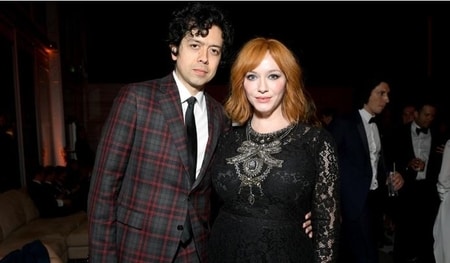 Geoffrey and Christina Hendricks attending the party